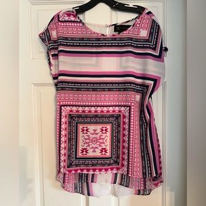 Kardashian Kollection tee with see through open back.